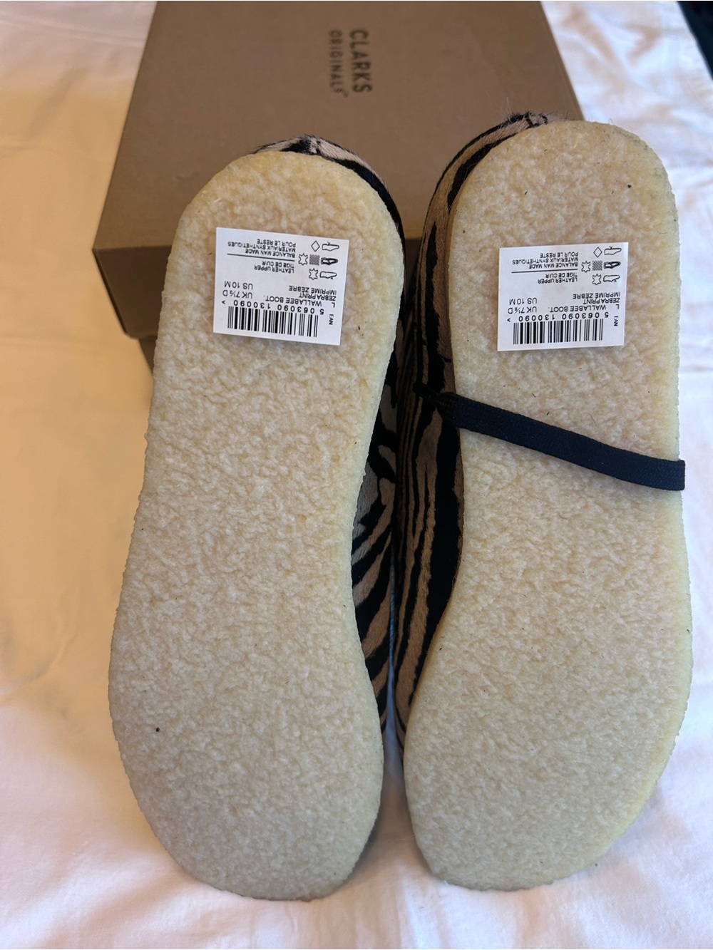 Clarks Women's Zebra Print Moccasins in Black and Tan